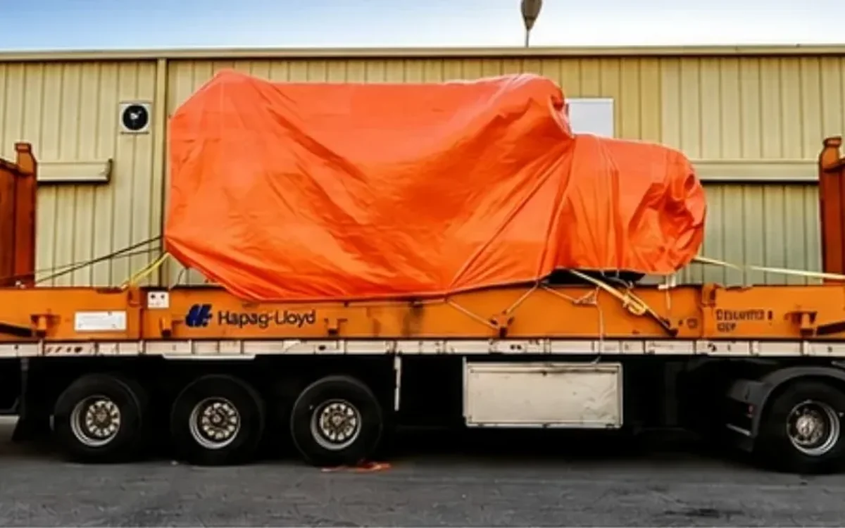 Heavy cargo secured on a flat rack during Aqaba port operations