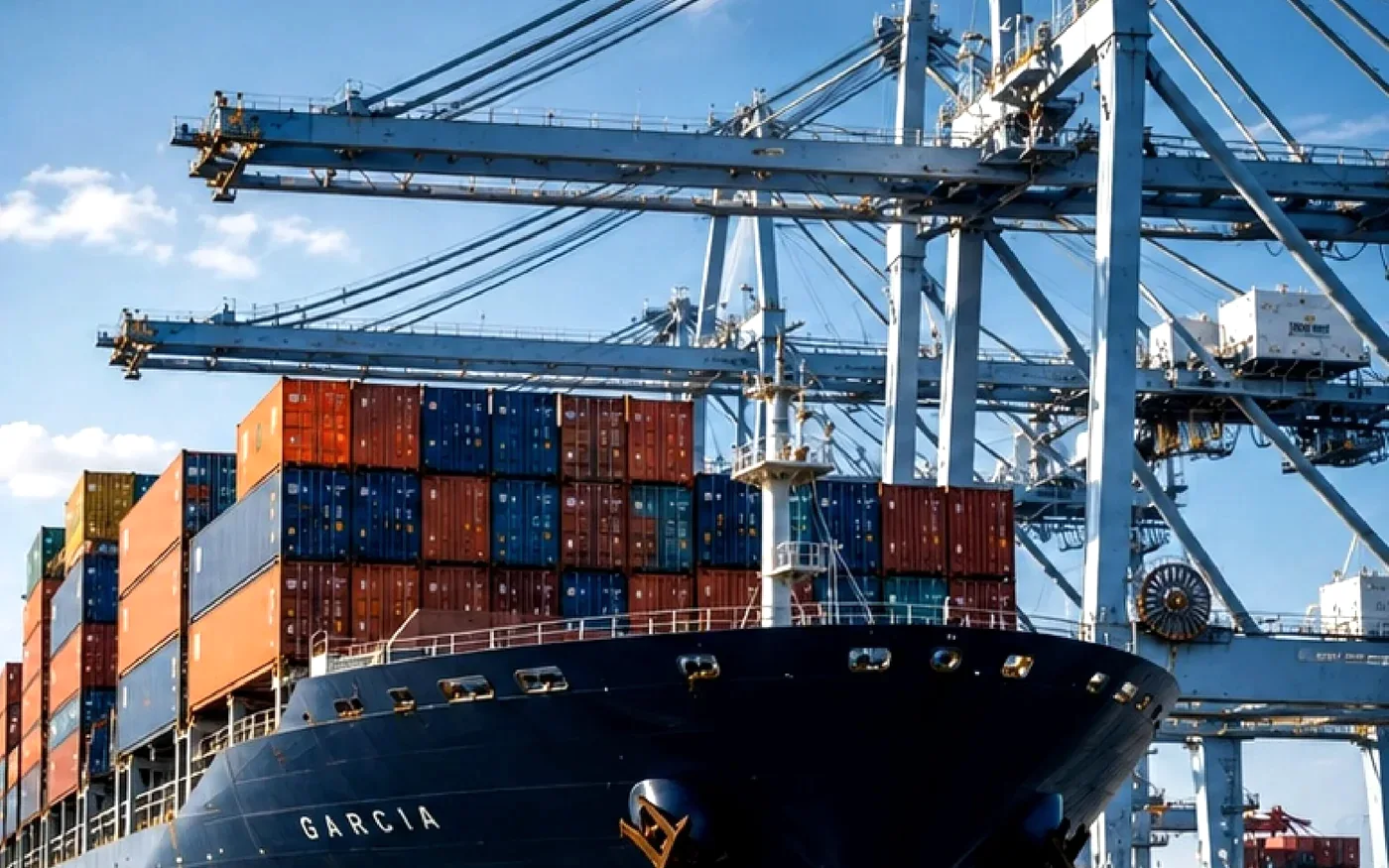 Container vessel loaded with containers berthed at an international seaport