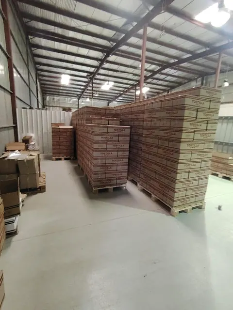 Palletized export cartons stacked in the warehouse