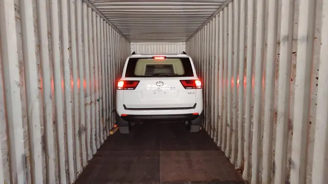New SUV lashed inside a 40ft container before export